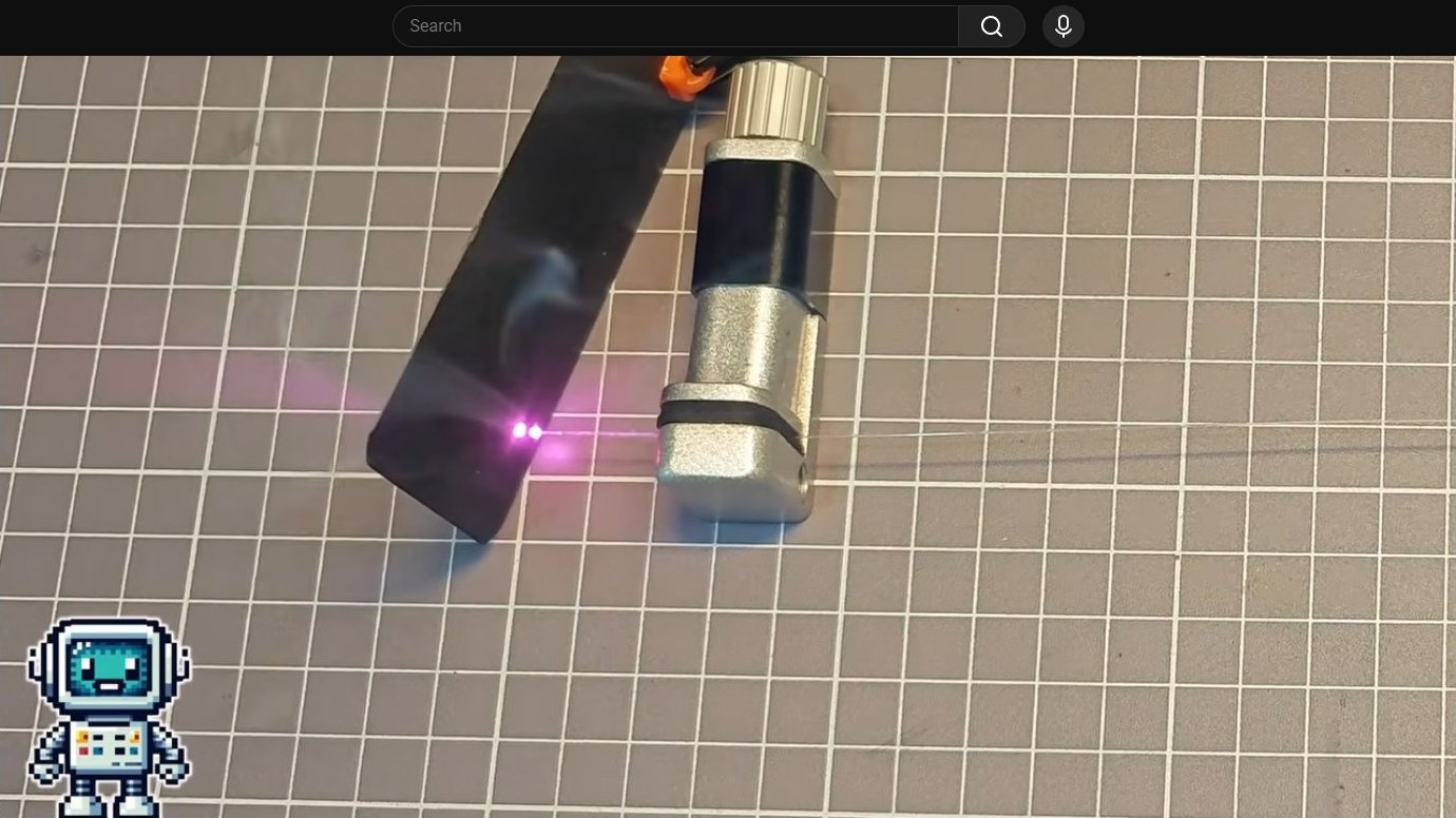 Infrared laser module emitting pink beam during testing