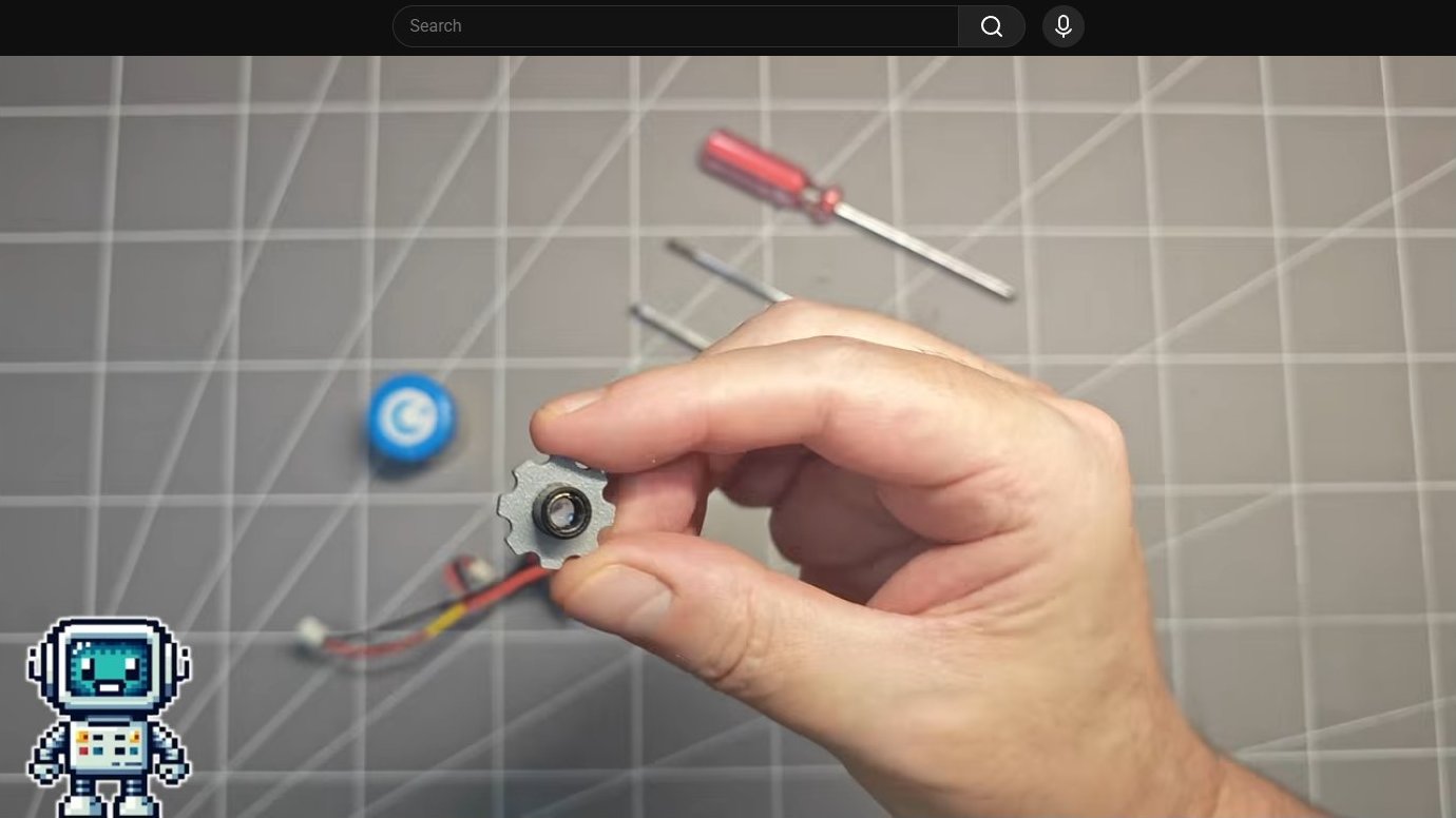 Metal gear component held in hand