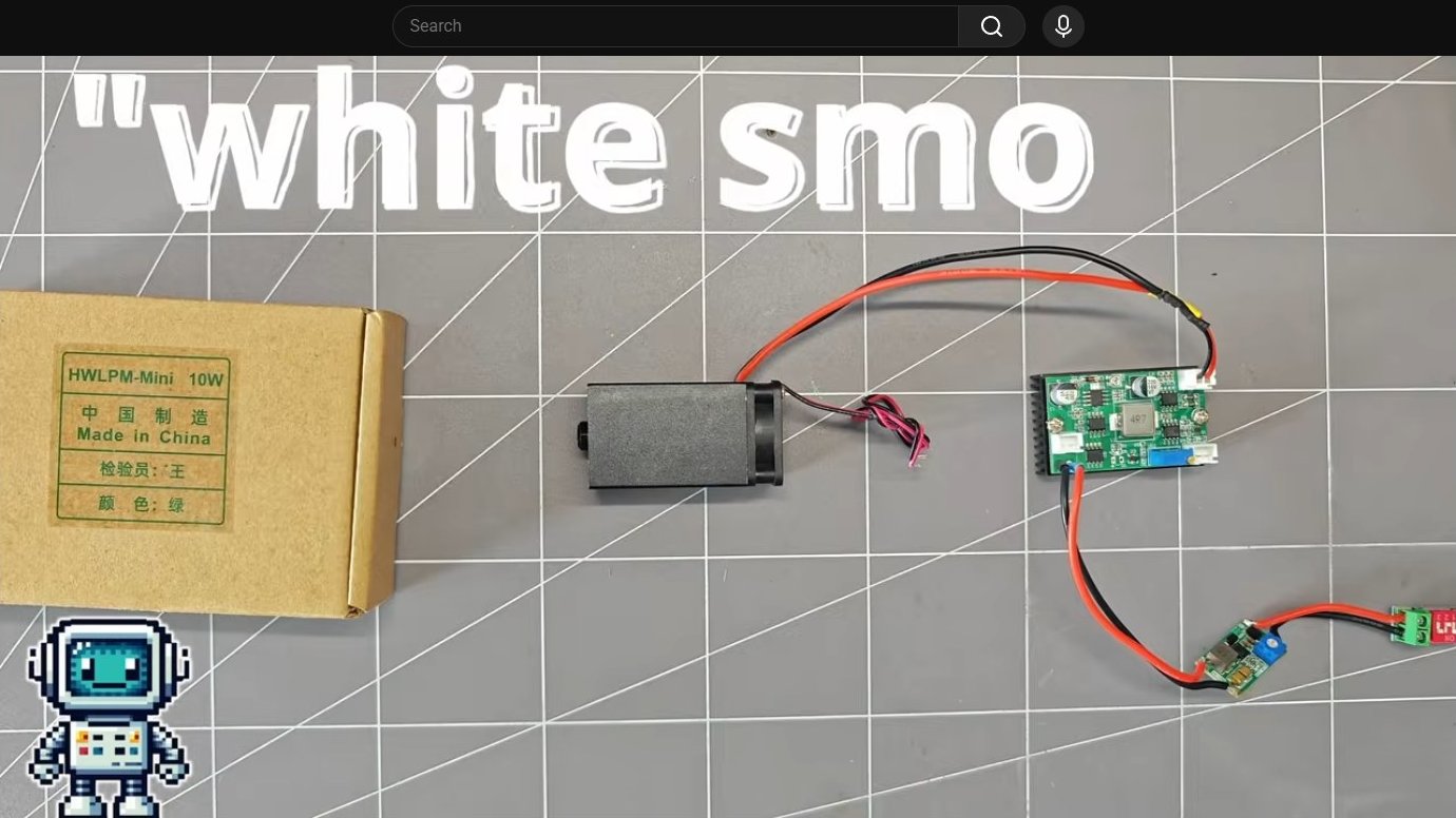 Wiring text visible on screen: white smoke fills the frame