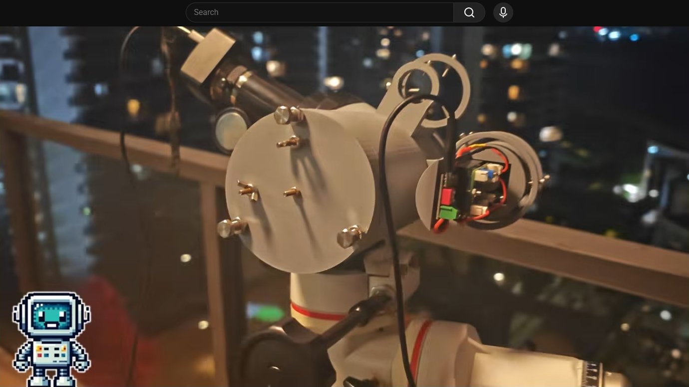 Telescope and laser mounted on tripod with wiring visible at night