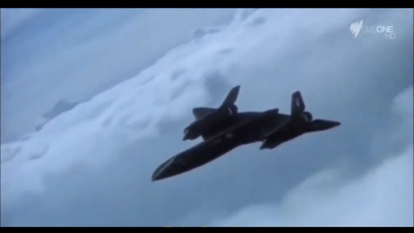 A supersonic aircraft generating visible shock waves in humid atmospheric conditions, demonstrating the Mach cone geometry that trails behind objects exceeding the speed of sound.